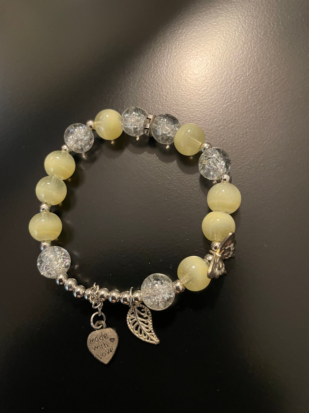 Heart wing charmed bracelet
