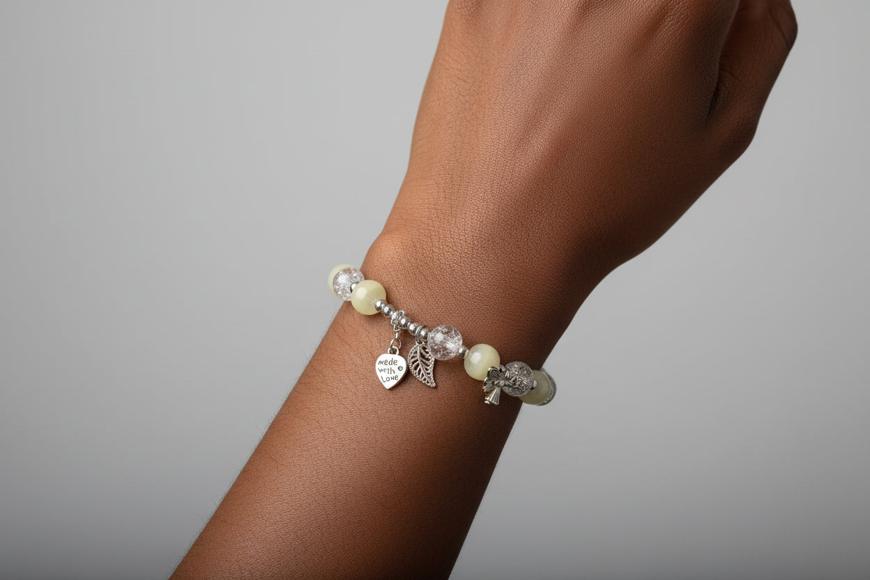 Heart wing charmed bracelet