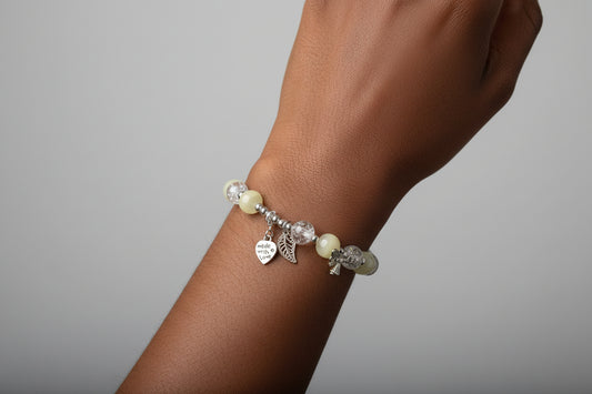 Heart wing charmed bracelet