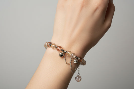 Bracelet with pink and clear beads.
