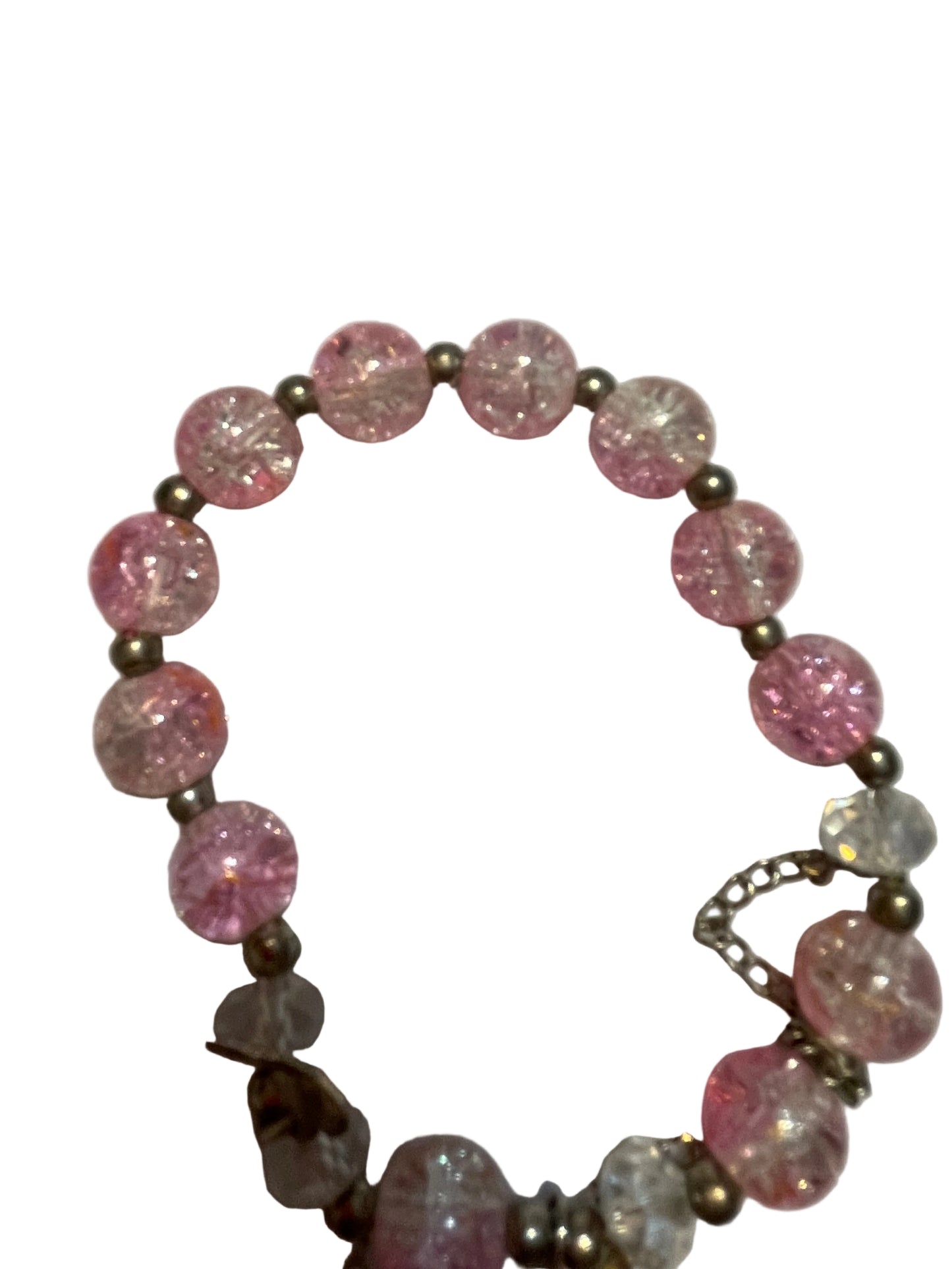 Bracelet with pink beads and a heart-shaped charm