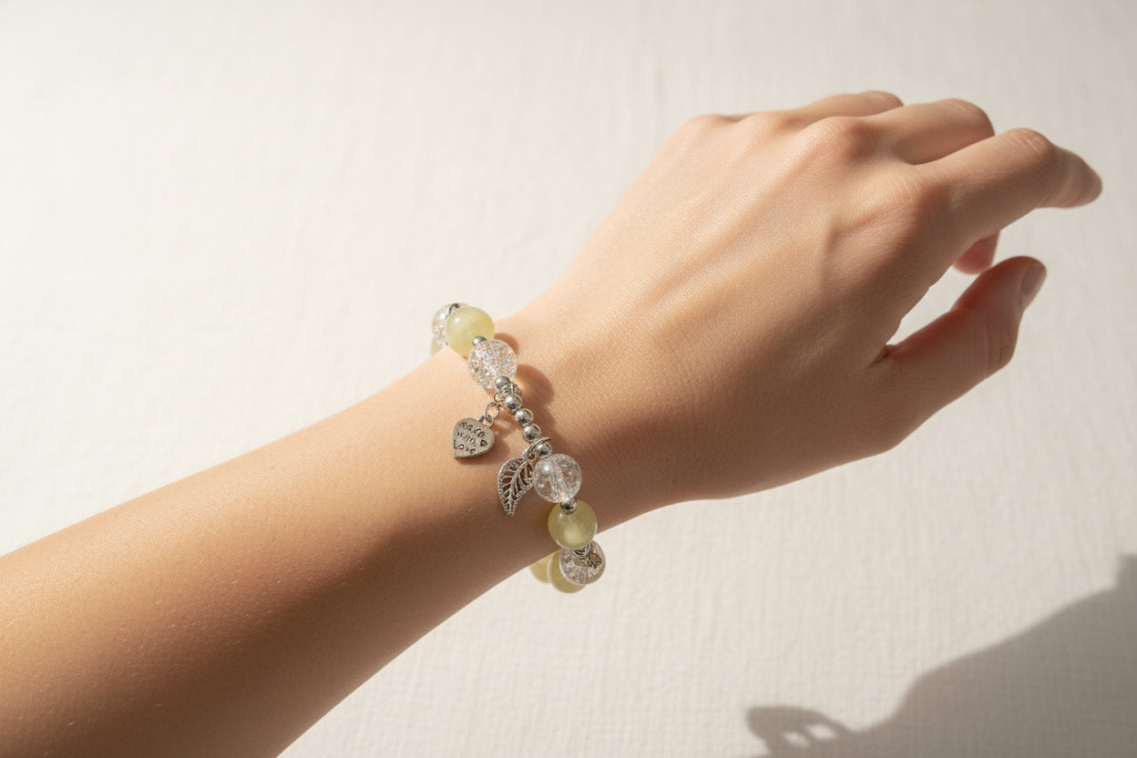 Heart wing charmed bracelet