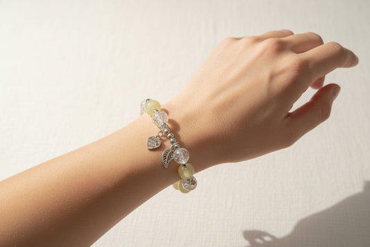 Heart wing charmed bracelet