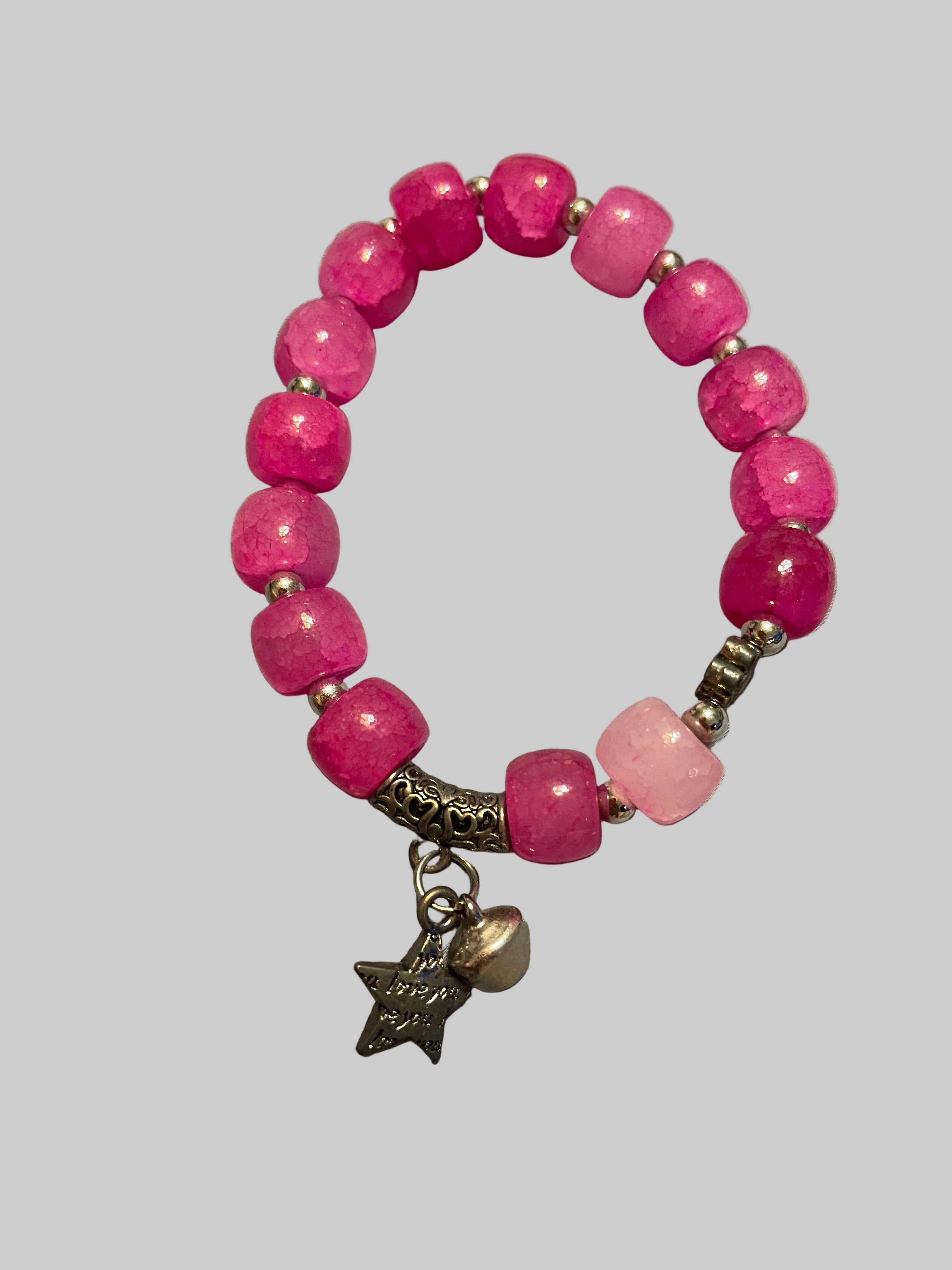 Pink bracelet with a star charmed