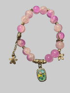 A flower charmed Pink bracelet