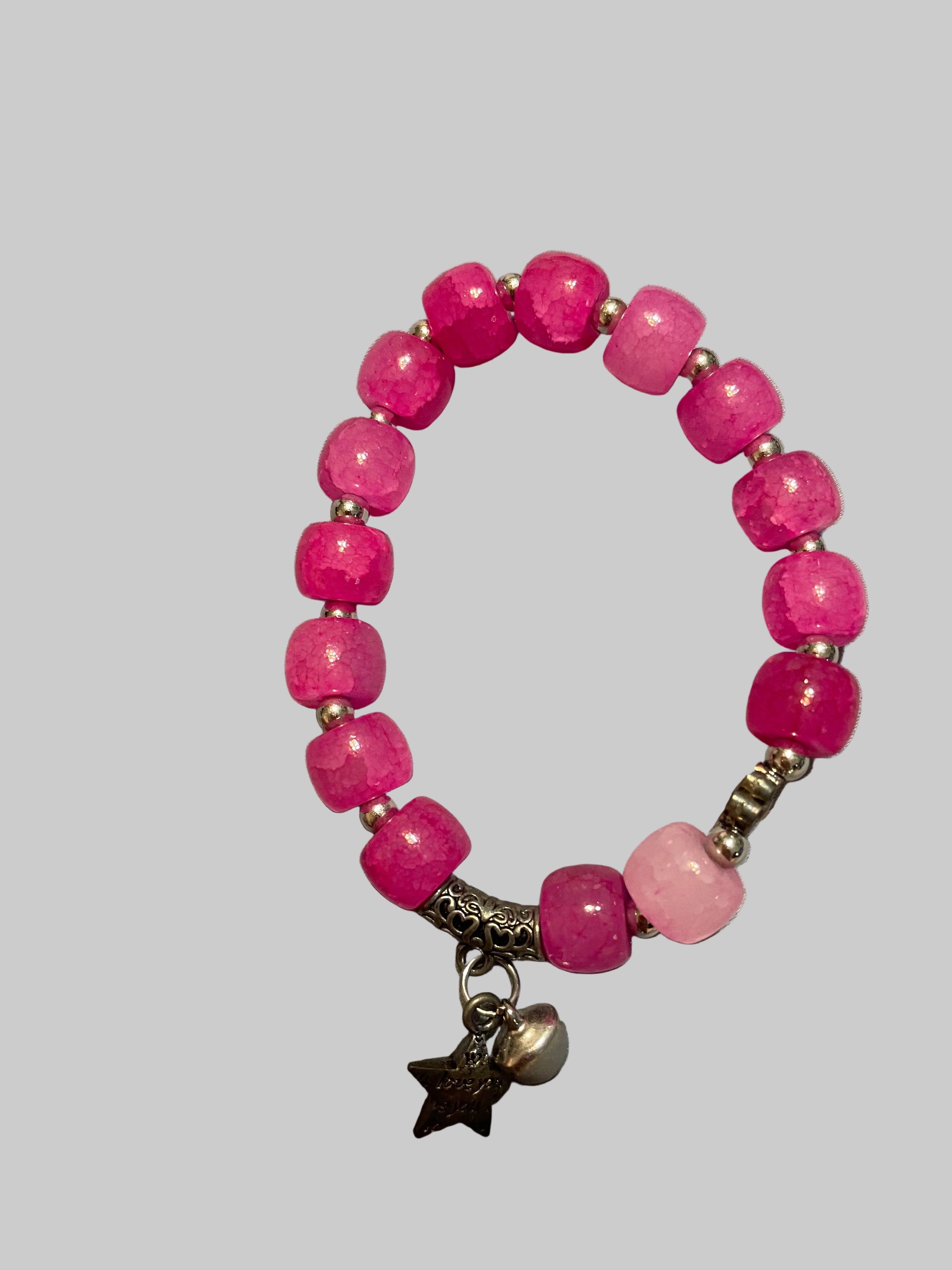 Pink bracelet with a star charmed