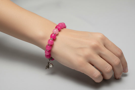 Pink bracelet with a star charmed
