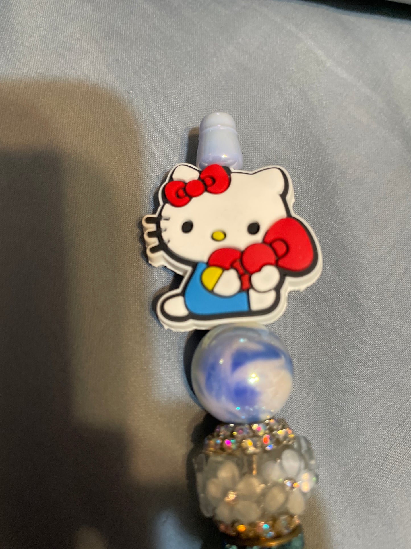 Hello kitty blue and red beaded pen