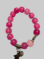 Pink bracelet with a star charmed
