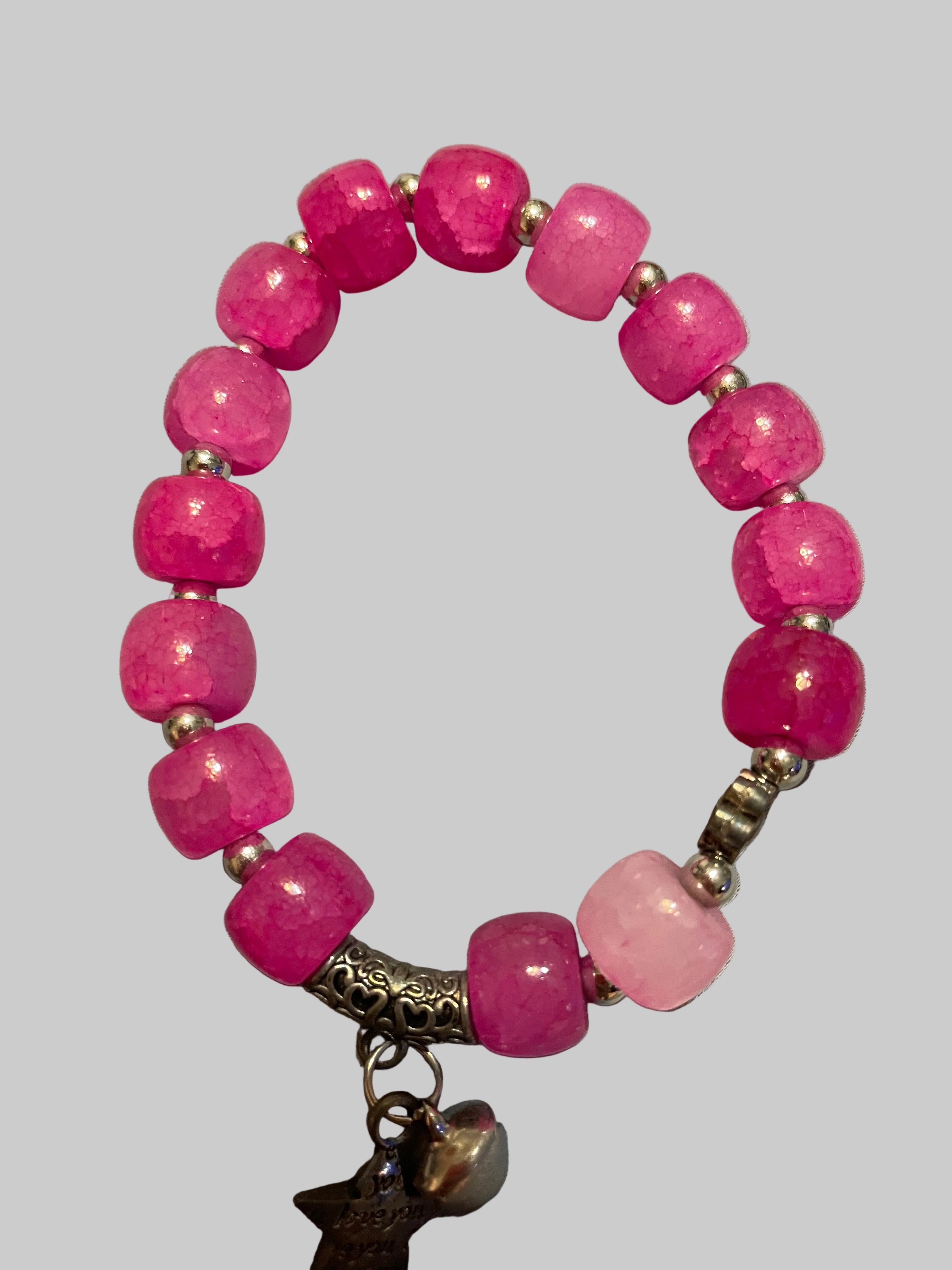 Pink bracelet with a star charmed