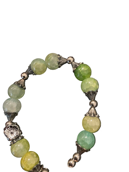 Star and Moon charmed green bracelet