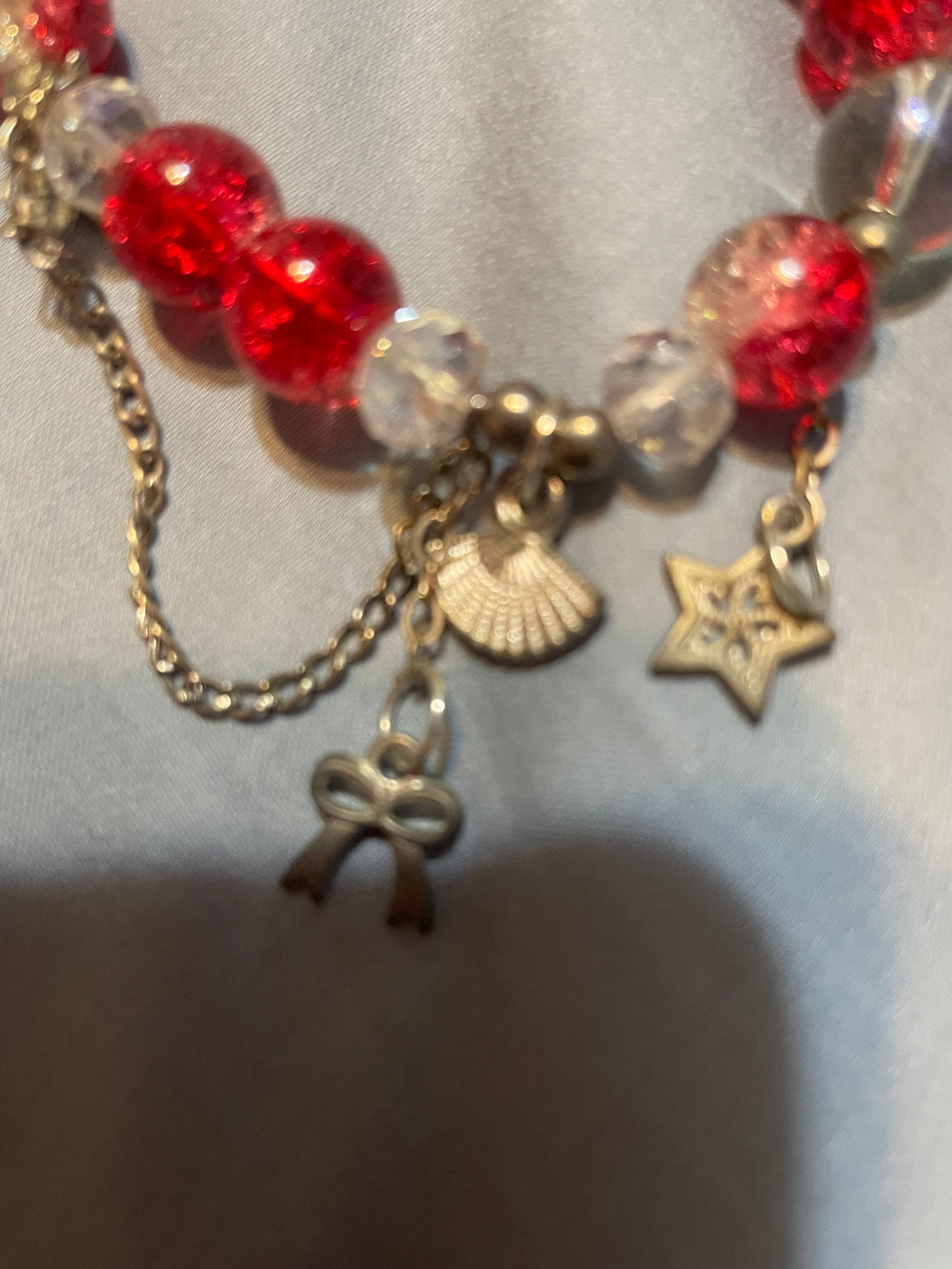 A Bow and star charmed bracelet