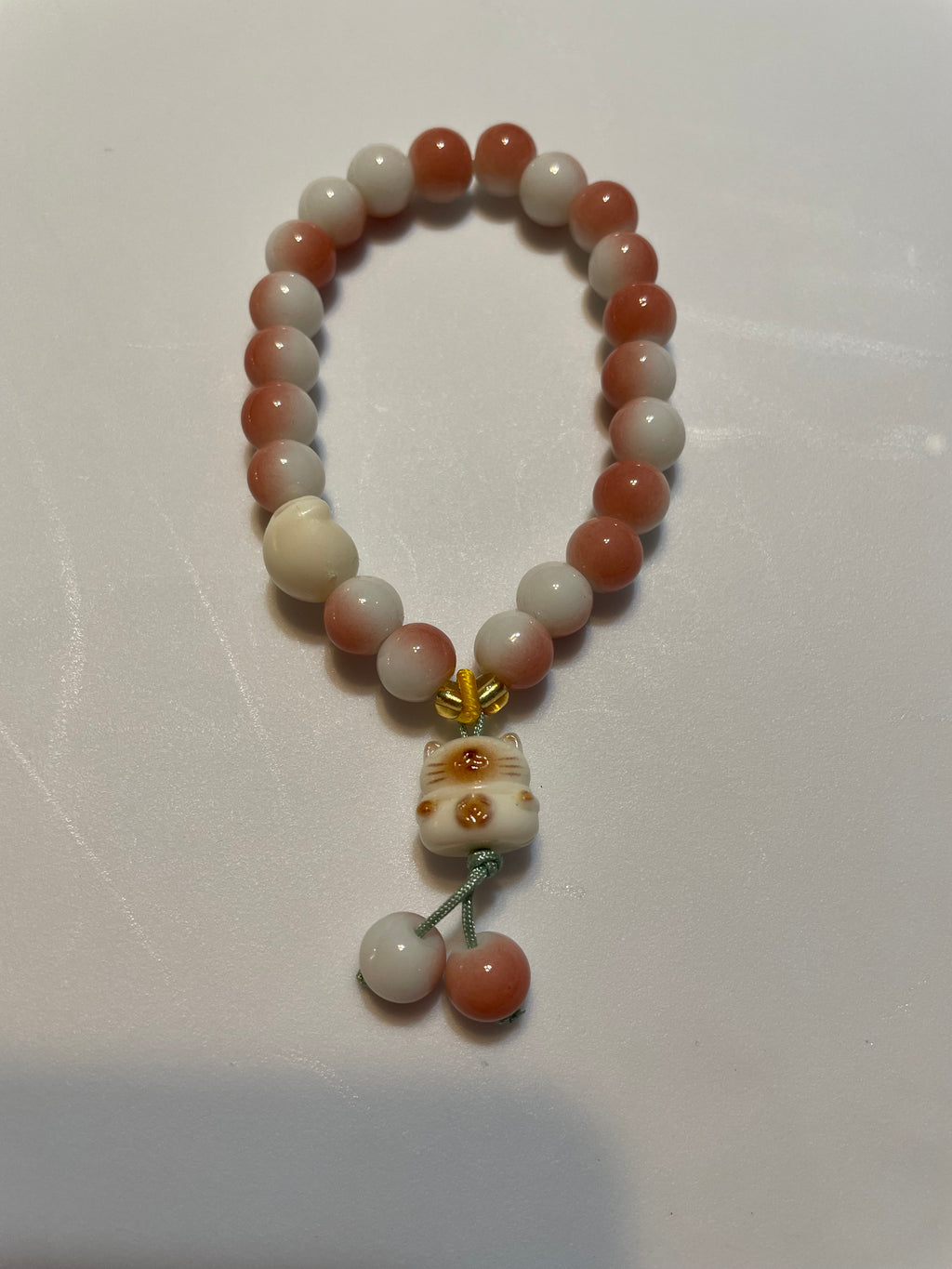 Pink and White beaded Bracelets with a bear charm