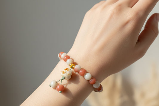 Pink and White beaded Bracelet with a bear charm