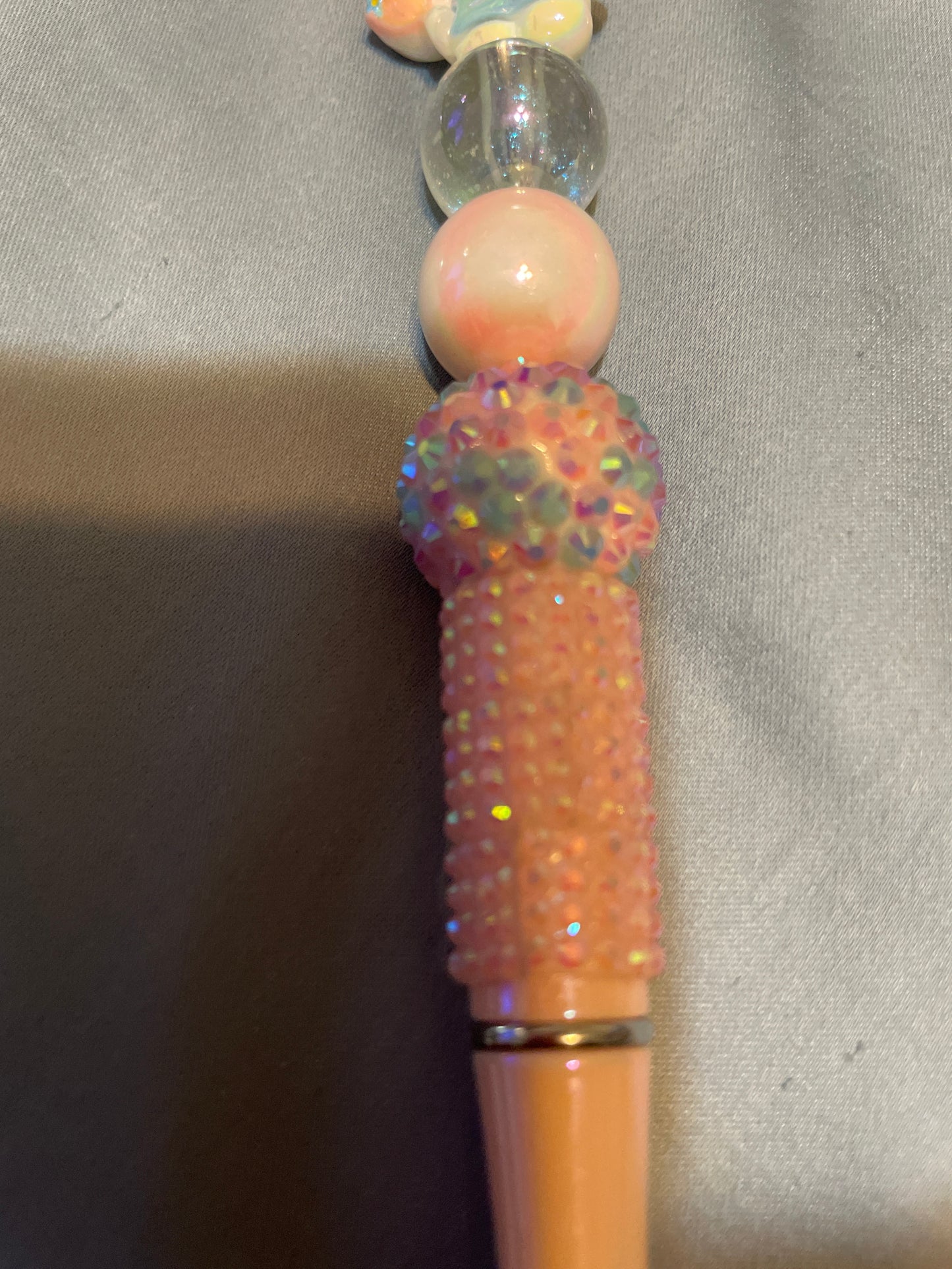 Hello kitty’s blue beaded pen