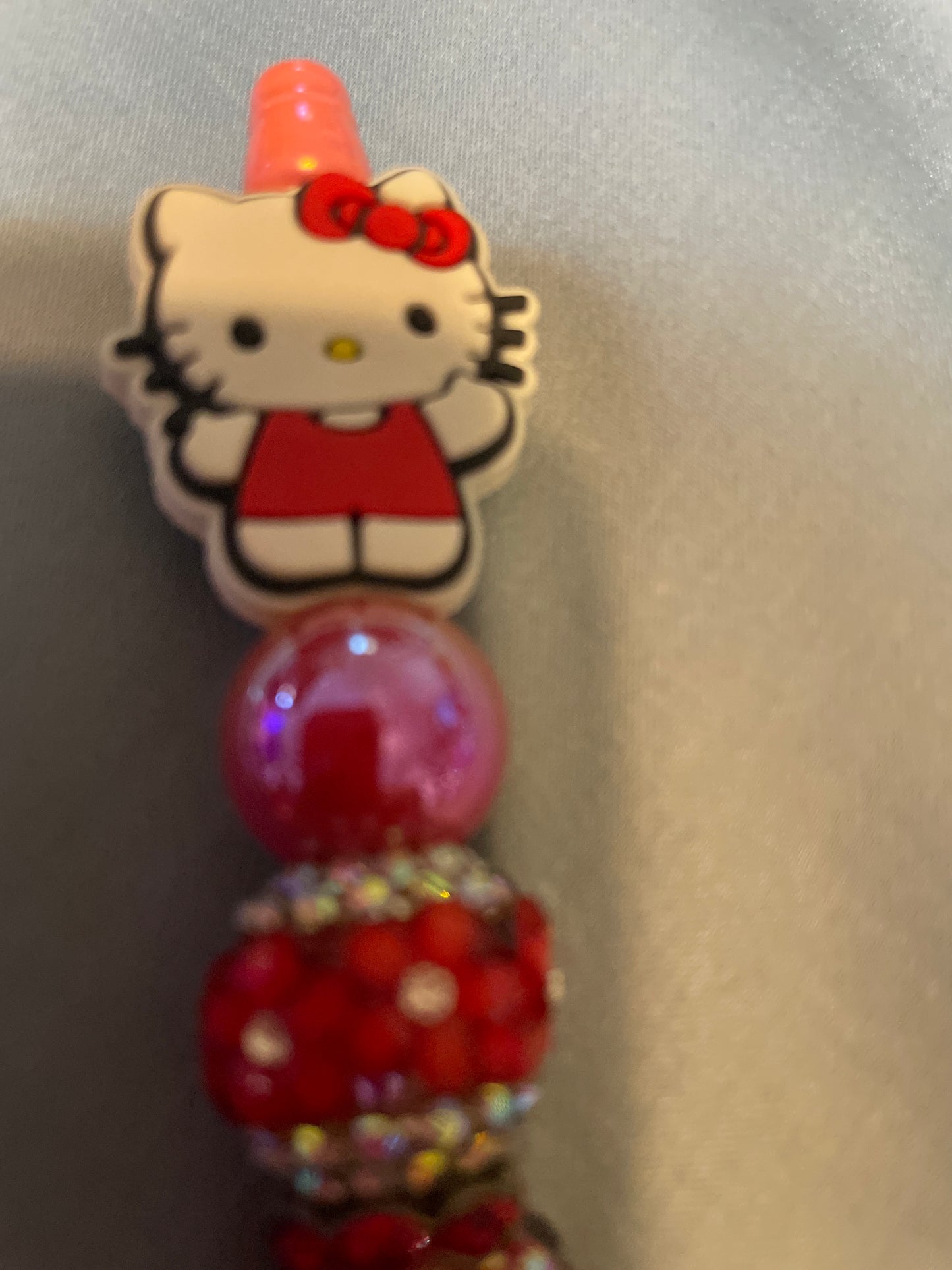 Hello kitty red beaded pen