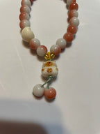 Pink and White beaded Bracelets with a bear charm