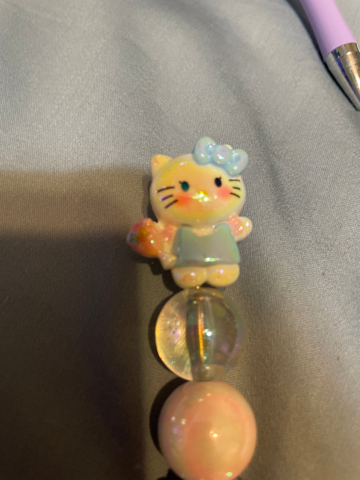 Hello kitty’s blue beaded pen