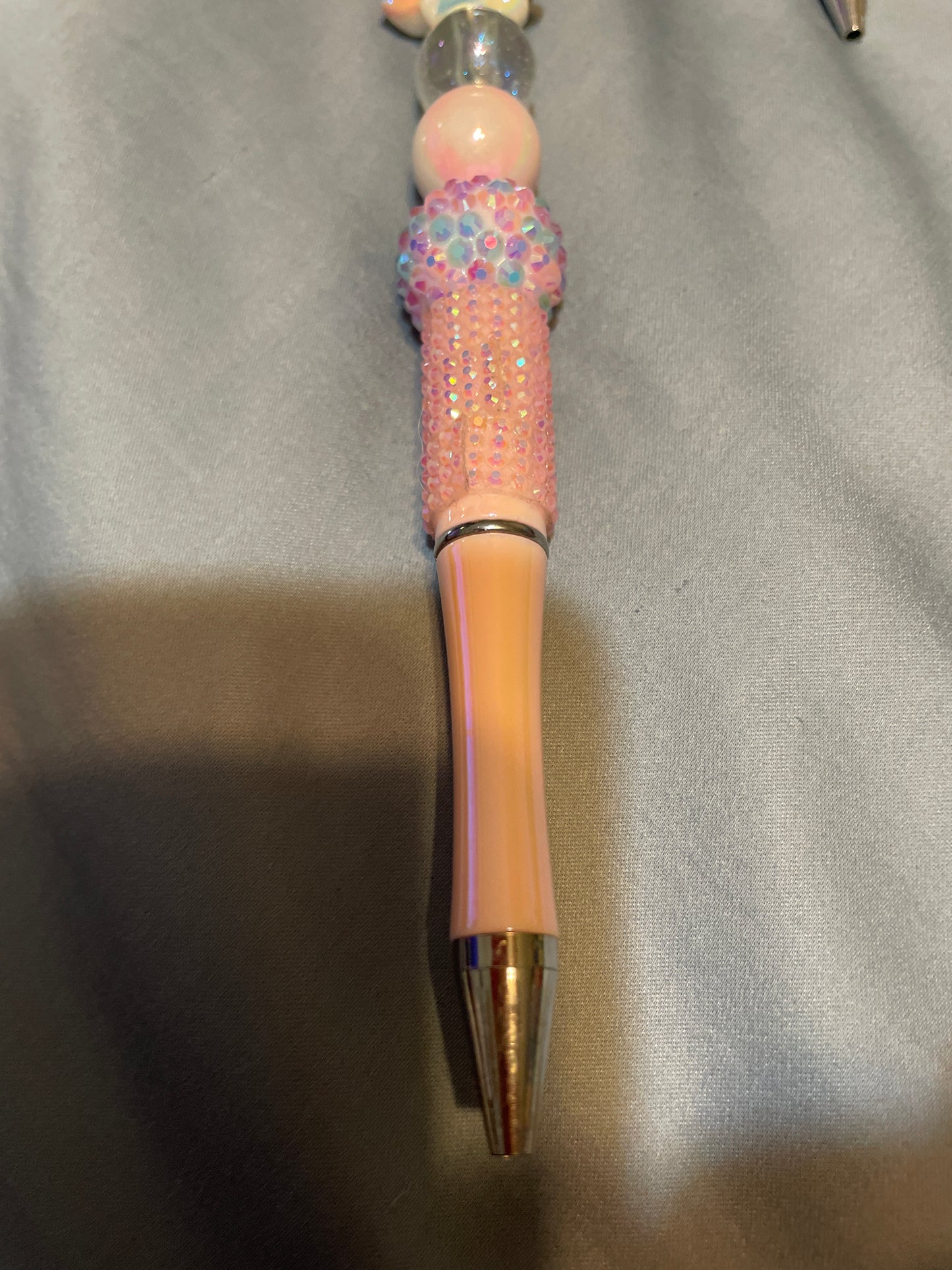 Hello kitty’s blue beaded pen