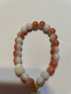 Pink and White beaded Bracelets with a bear charm