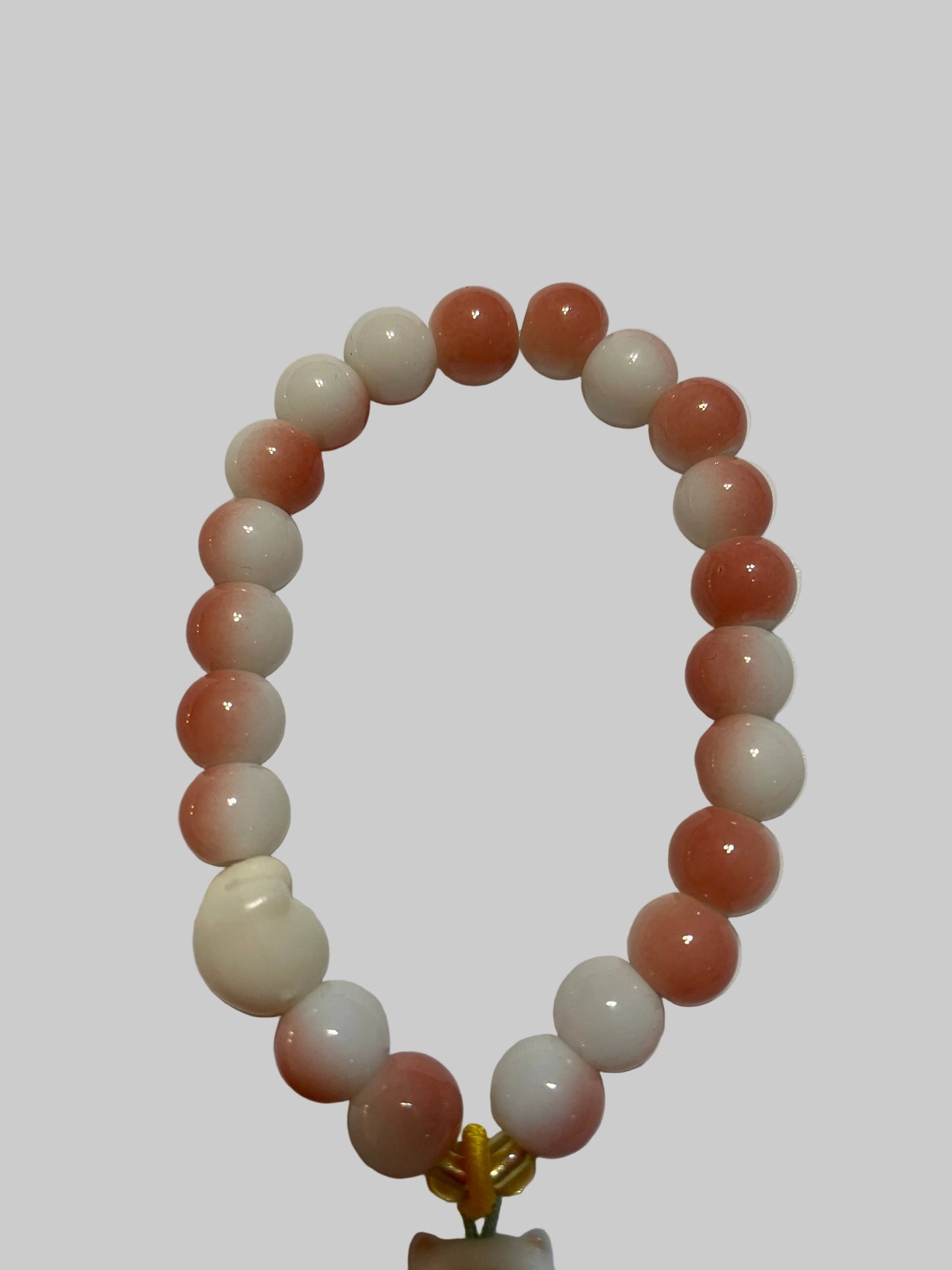 Pink and White beaded Bracelet with a bear charm