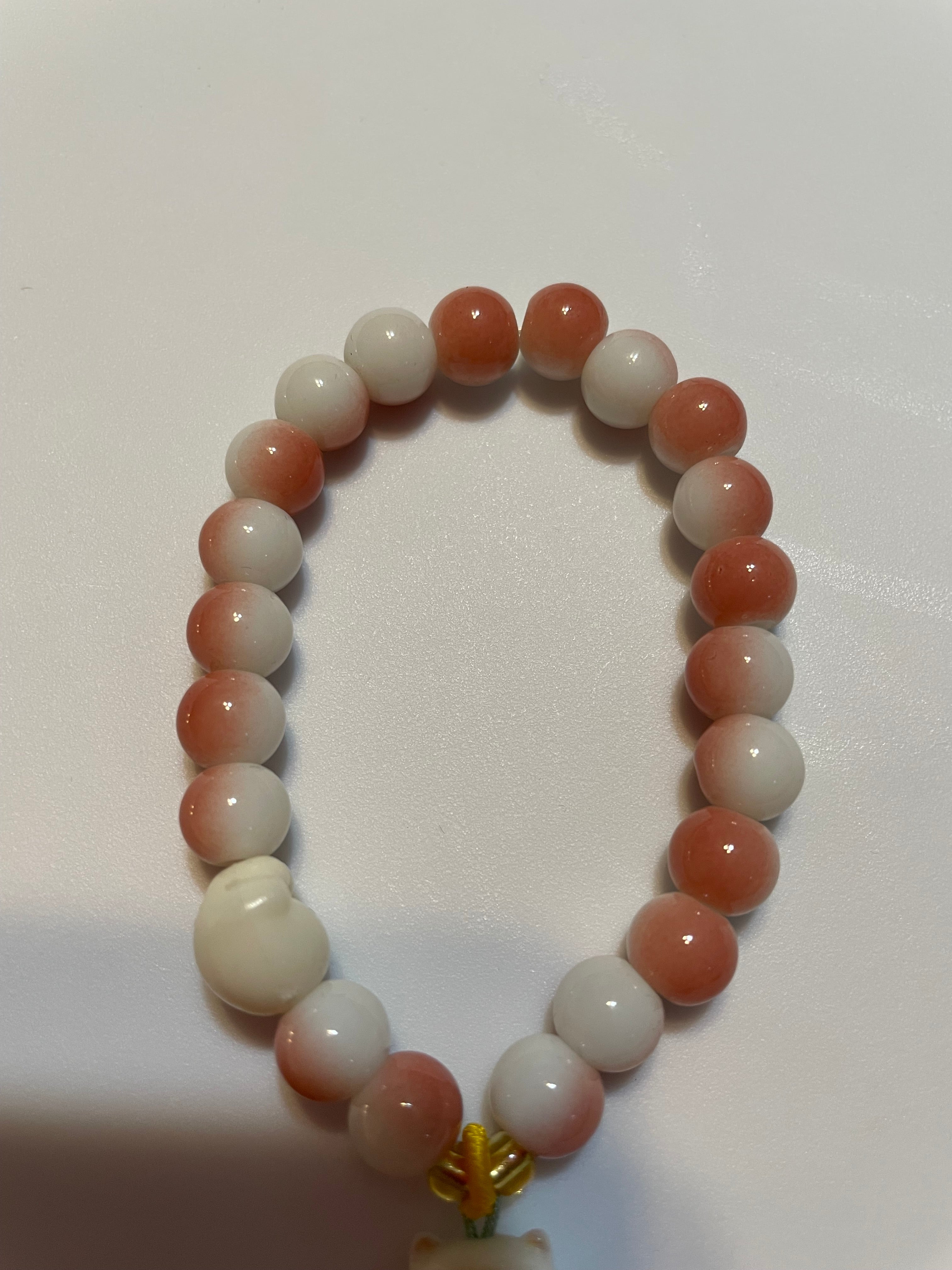 Pink and White beaded Bracelets with a bear charm